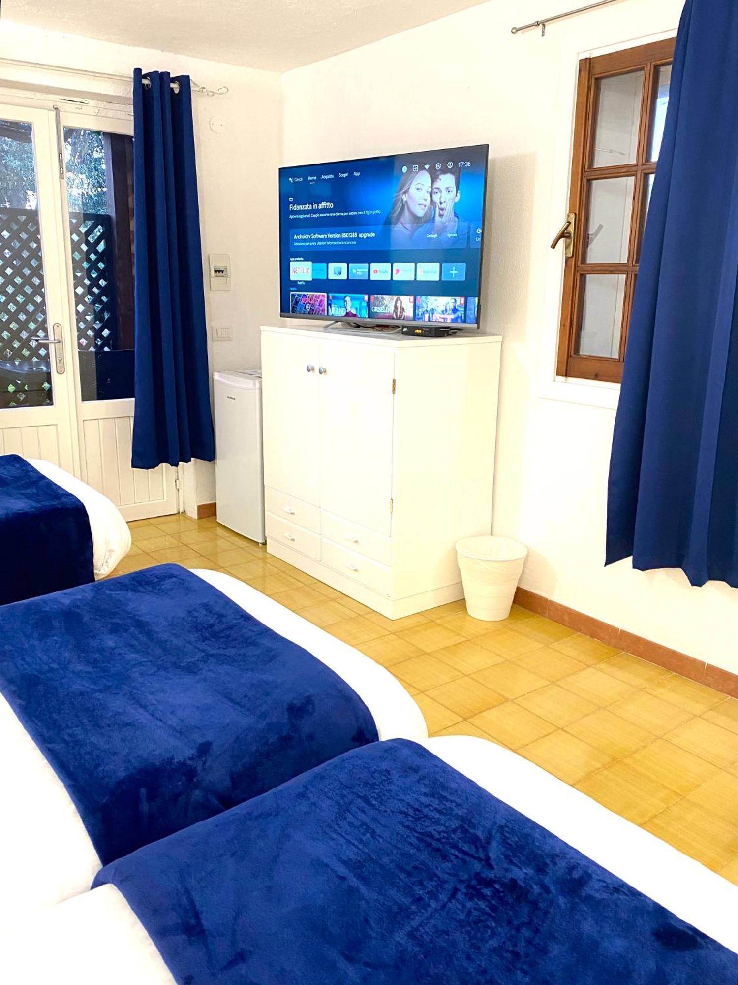 Cala Reale Rooms Marinella Маринела Екстериор снимка