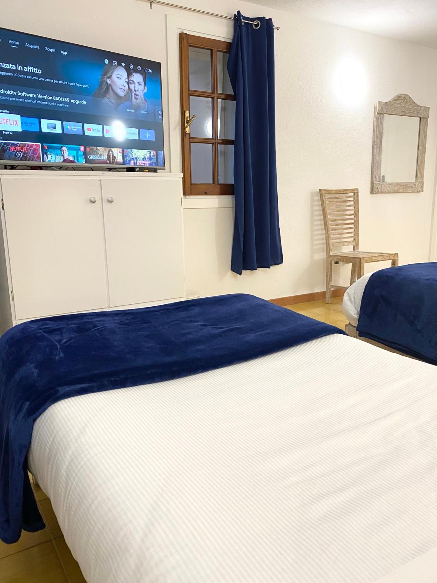 Cala Reale Rooms Marinella Маринела Екстериор снимка