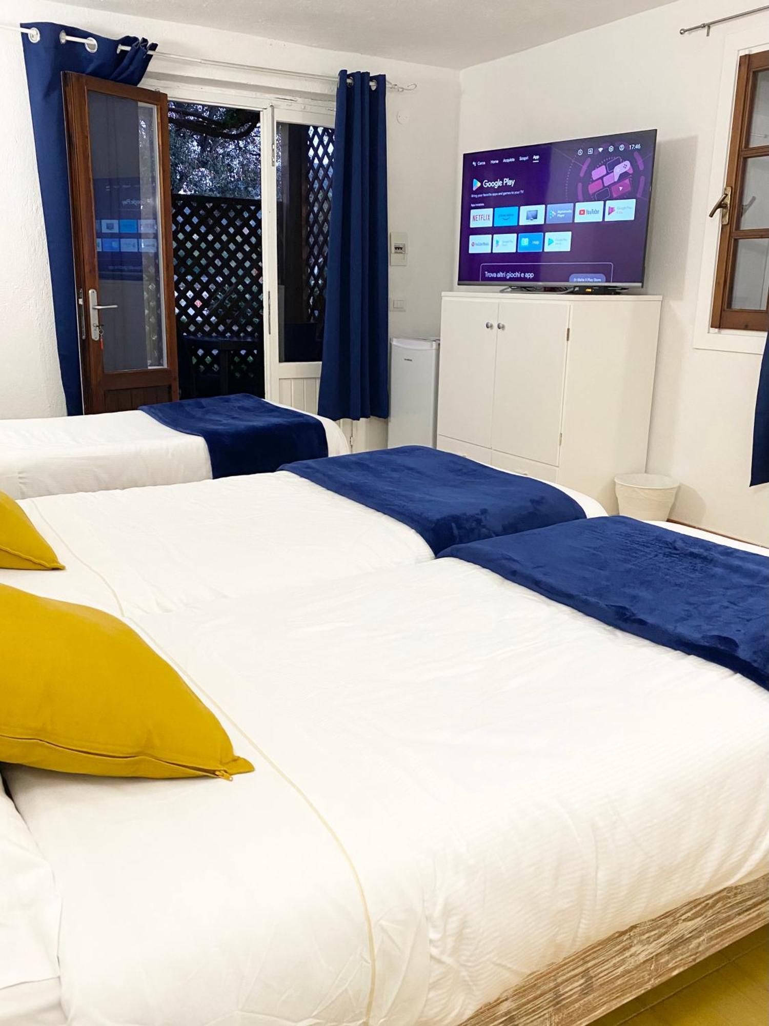 Cala Reale Rooms Marinella Маринела Екстериор снимка