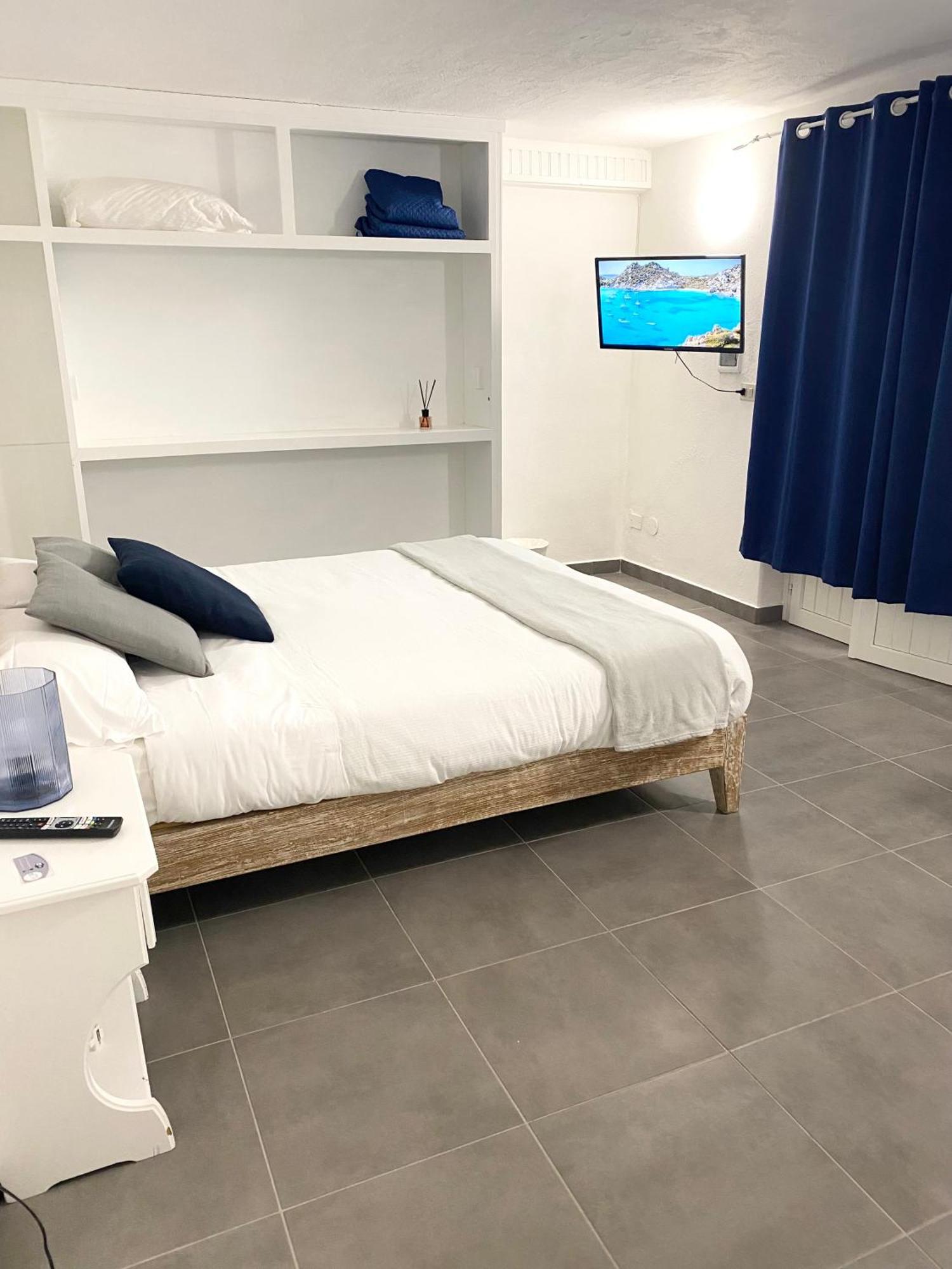 Cala Reale Rooms Marinella Маринела Екстериор снимка