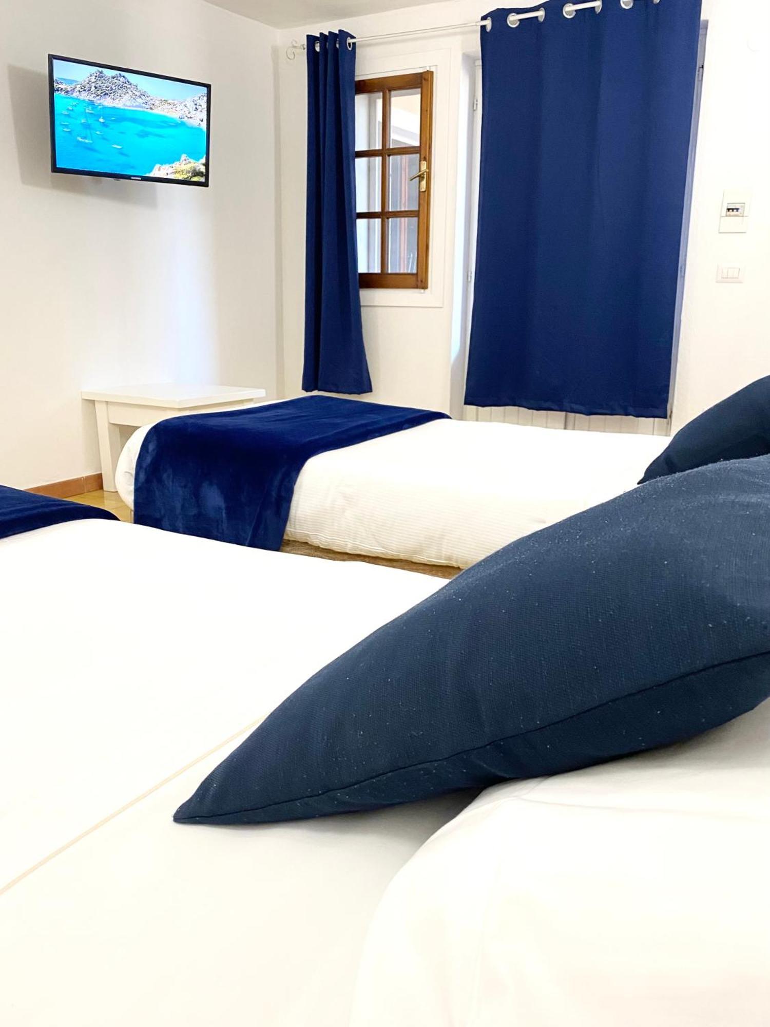 Cala Reale Rooms Marinella Маринела Екстериор снимка