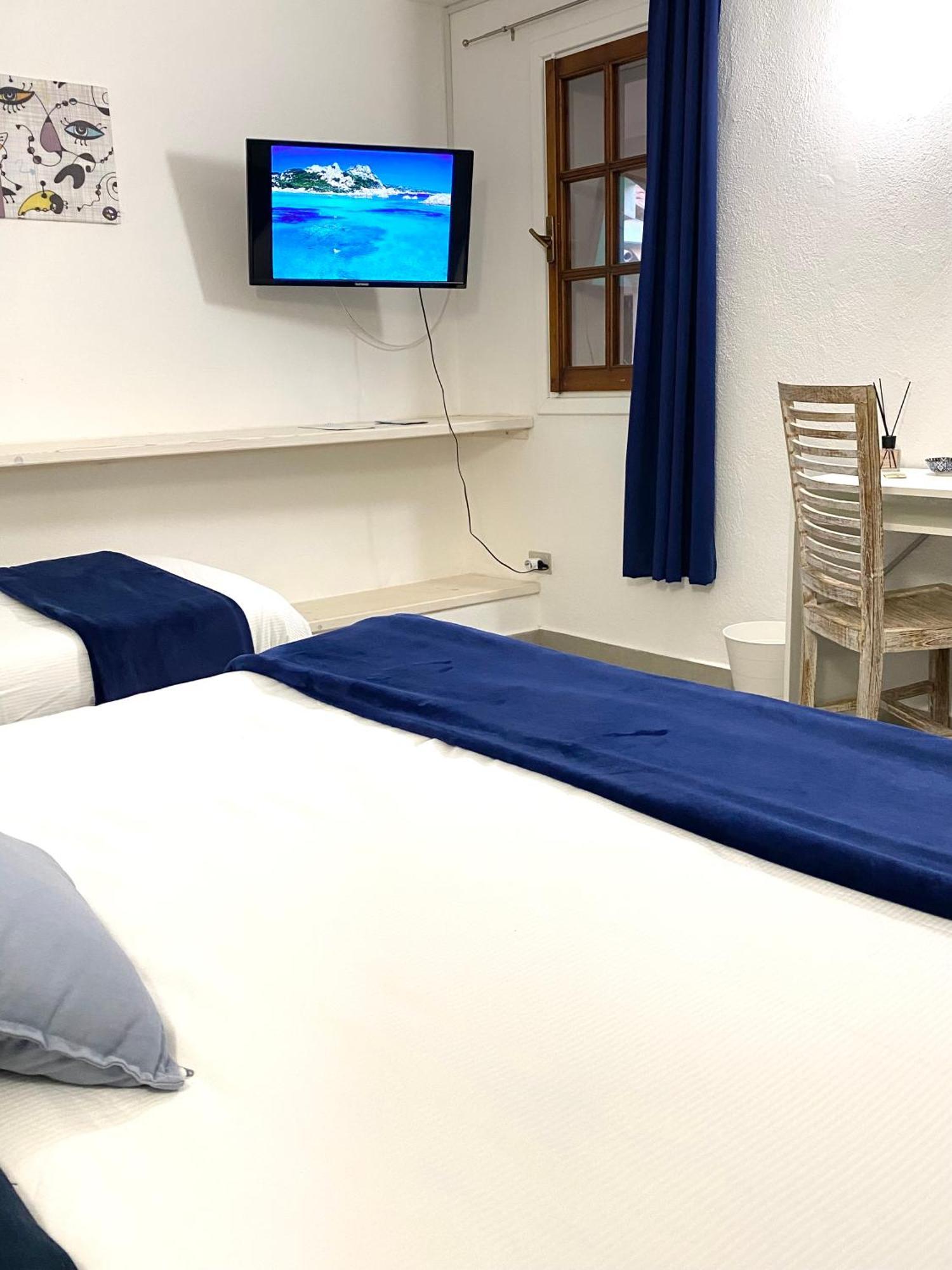 Cala Reale Rooms Marinella Маринела Екстериор снимка