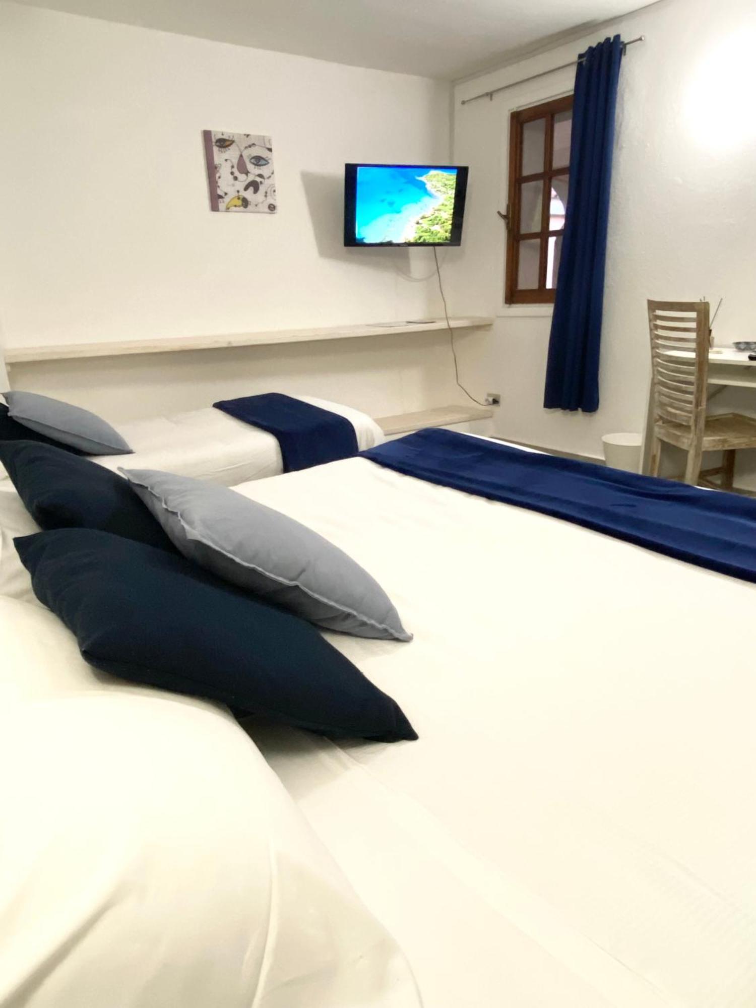 Cala Reale Rooms Marinella Маринела Екстериор снимка