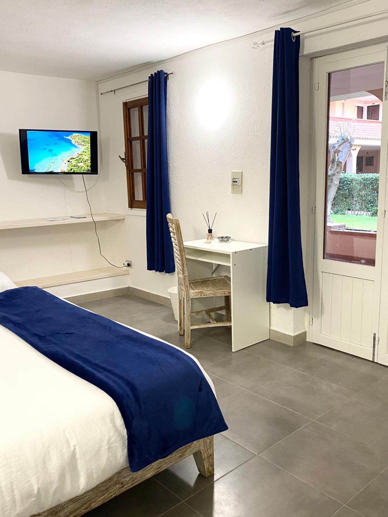 Cala Reale Rooms Marinella Маринела Екстериор снимка