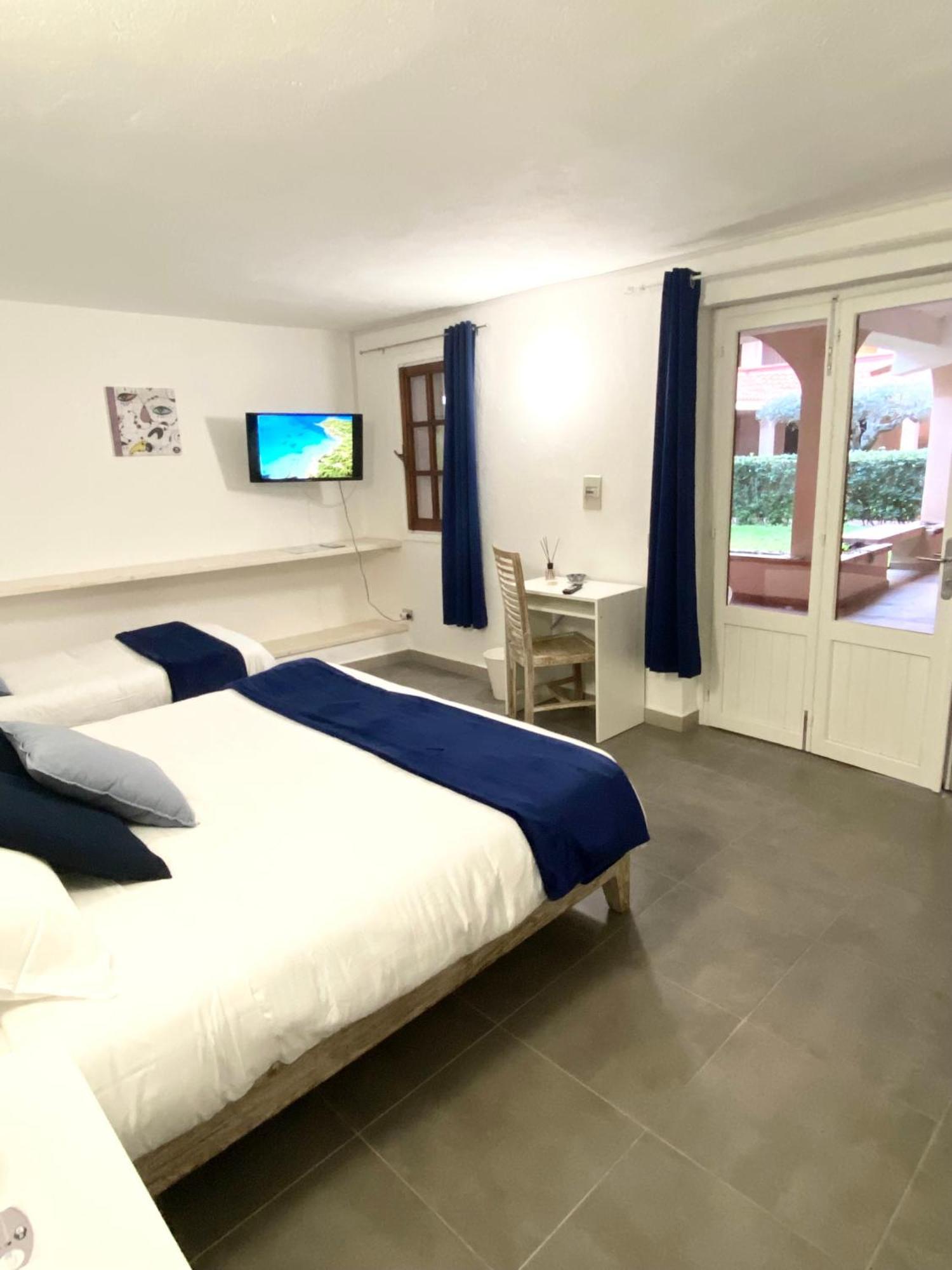Cala Reale Rooms Marinella Маринела Екстериор снимка