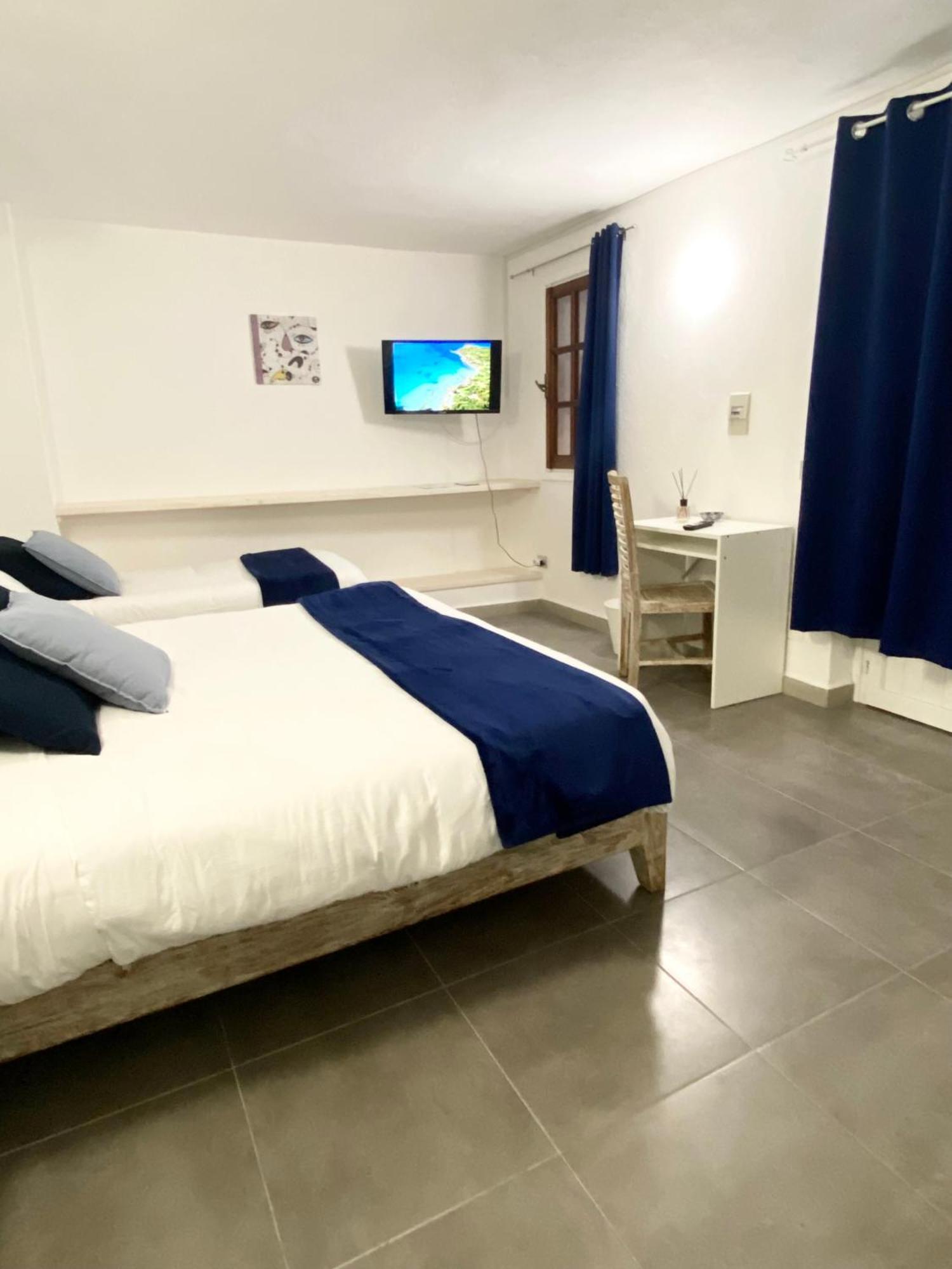 Cala Reale Rooms Marinella Маринела Екстериор снимка